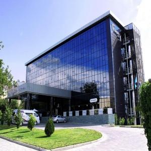 Гостиница ДаблТри бай Хилтон Шымкент