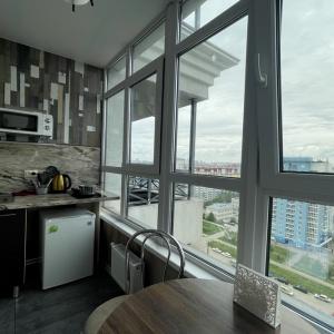 Accomodation facility Apartments on Vlasikhinskaya 65 A