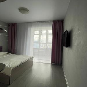 Accomodation facility Apartments on Vlasikhinskaya 65 A