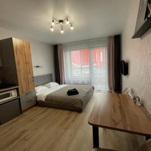 Accomodation facility Apartments on Vlasikhinskaya 65 A