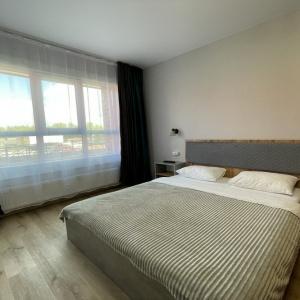 Accomodation facility Apartments on Vlasikhinskaya 65 A