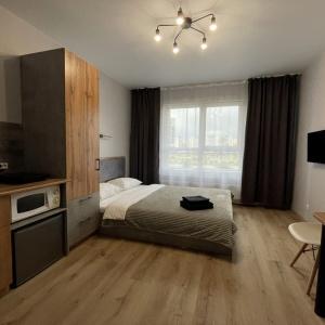 Accomodation facility Apartments on Vlasikhinskaya 65 A