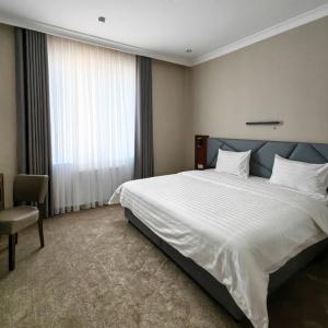 Hotel Reikartz Qarshi