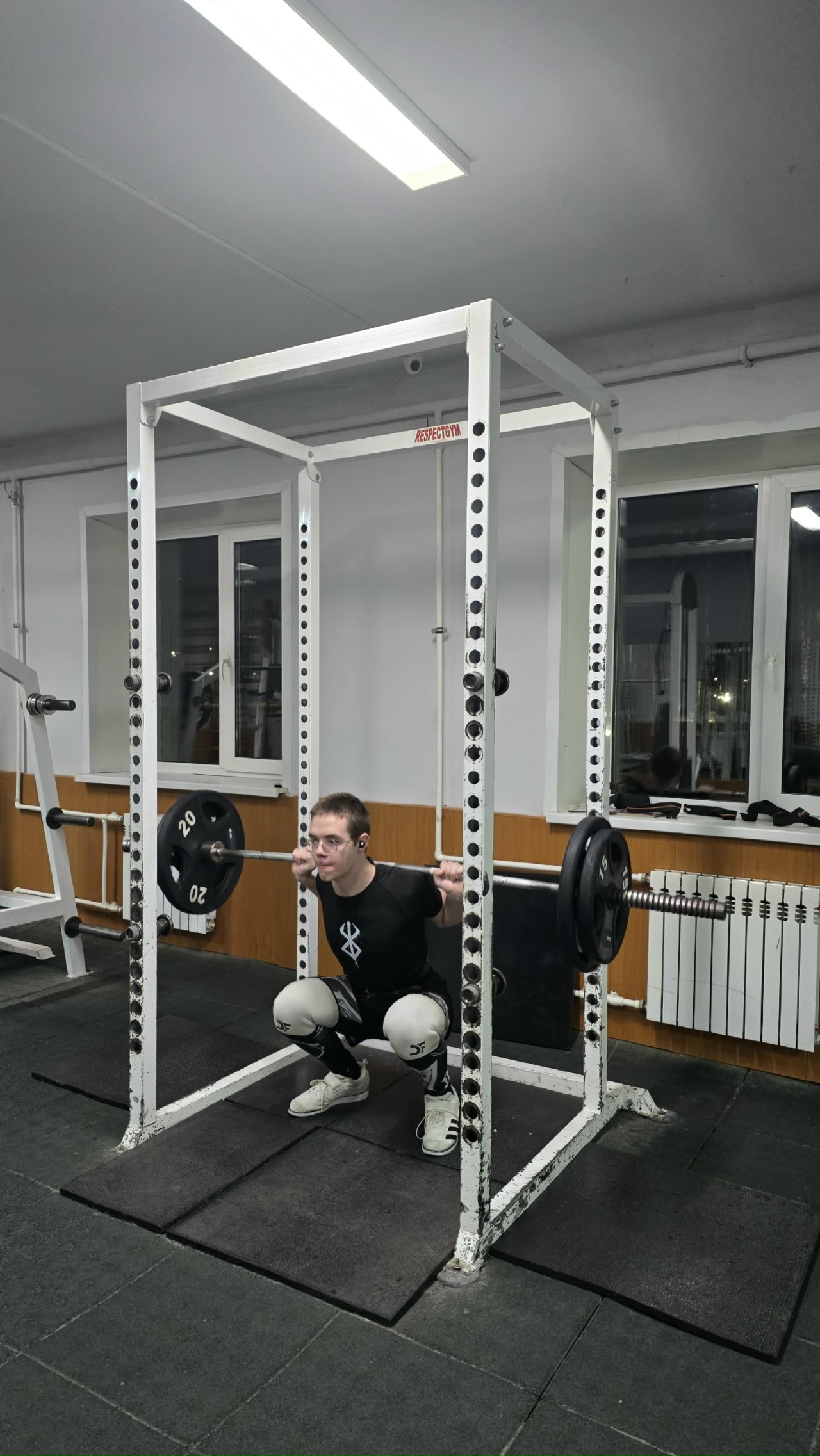 Тренировка по пауэрлифтингу