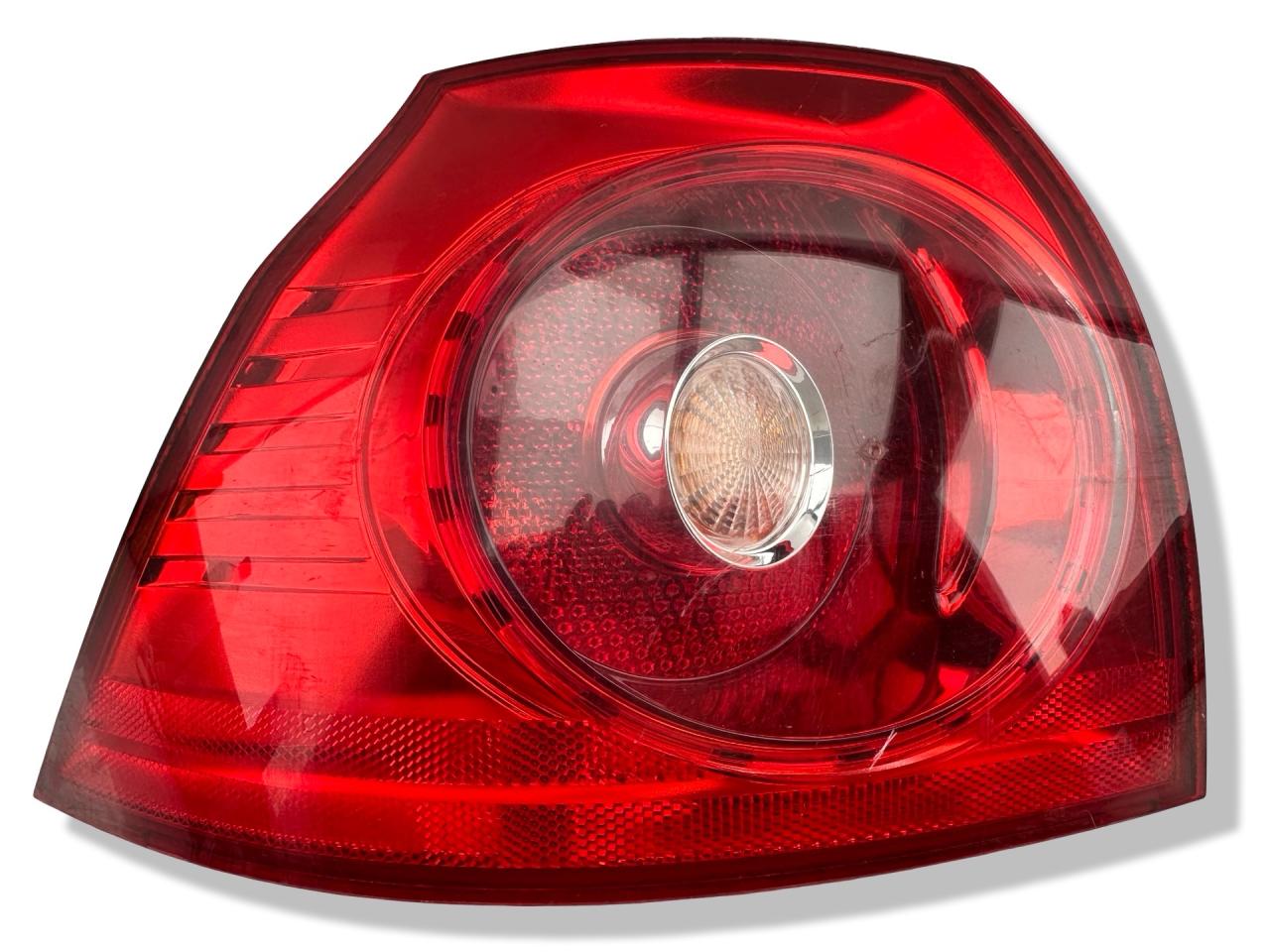 фонарь задний левый Volkswagen Golf 5 поколение 2004, 1.4 л., i, BCA, бензин, 5МКПП, синий, хетчбэк 5 дв., передний привод, правый руль, 1K6945095E - фото №1