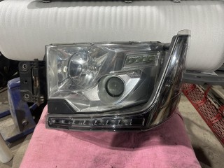 фара левая Renault T-Series 1 поколение (2013 - 2026), 89207611, 7482251331