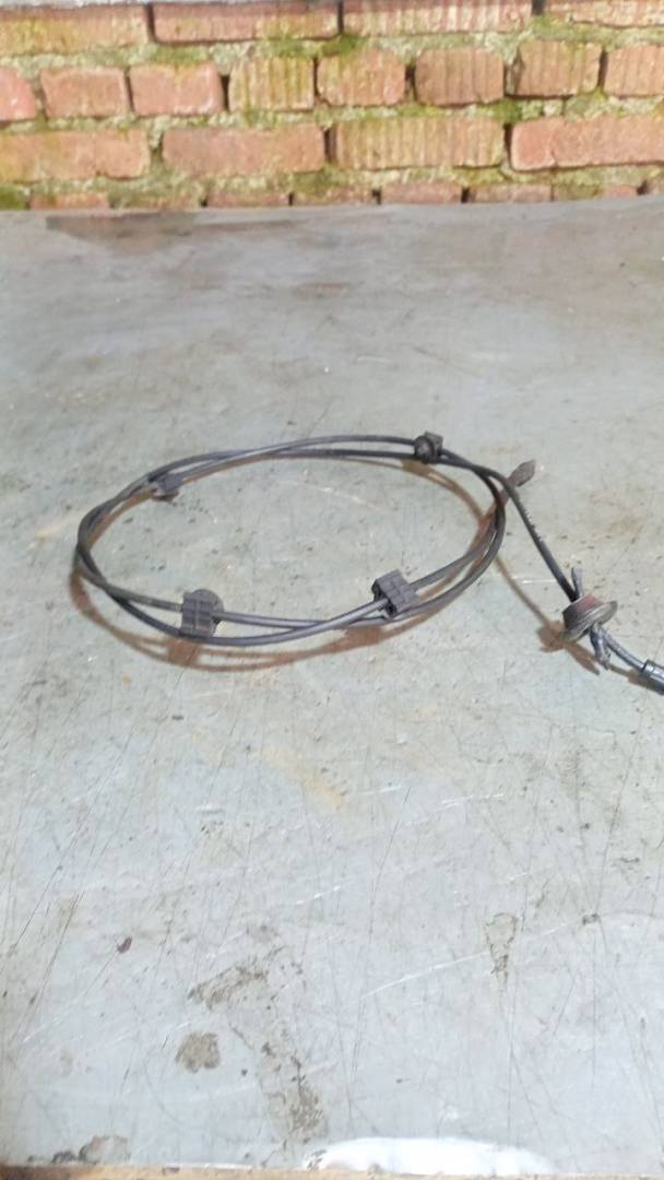 трос капота Dodge Caravan 4 поколение (2000 - 2007) - фото №1