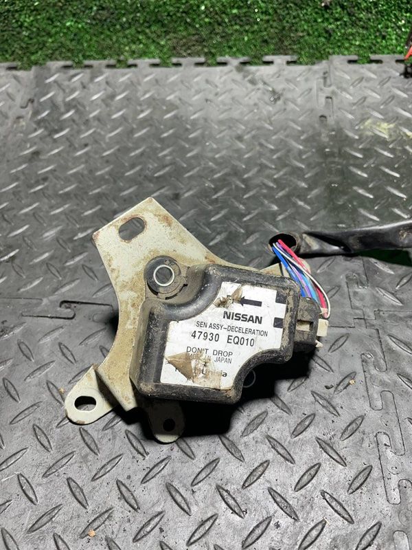 датчик ускорения Nissan X-Trail T30 2004, 2.2 л., 47930EQ010 - фото №1