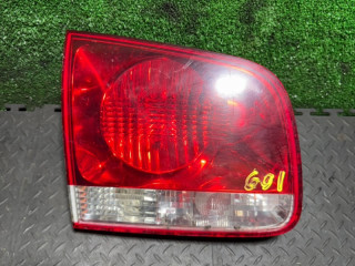 фонарь крышки багажника левый Volkswagen Touareg 1 поколение 2006, 2.5 л., 7L6945093J