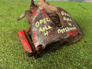 суппорт передний правый Opel Astra H (2004 - 2007), 1.8 л., Z 18 XER, бензин, МКПП