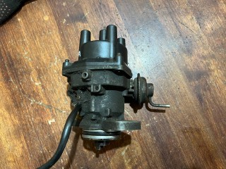 распределитель зажигания (трамблёр) Nissan Primera P11 [рестайлинг] 2001, 1.8 л., QG18DE, бензин, МКПП, седан, 2210071J10