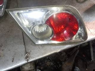 фонарь крышки багажника левый Mazda 6 1 поколение [рестайлинг] (2005 - 2008), 2.0 л., бензин, МКПП, седан