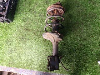 стойка передняя левая Mitsubishi Lancer 9 поколение (2003 - 2010)