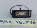 подсветка номера BMW X6 F16 2016, 3.0 л., бензин, правый руль, 7193293 - фото №2