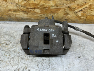 суппорт передний левый Mazda 323 6 поколение 1998, бензин