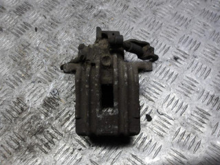 суппорт задний левый Volkswagen Golf 4 поколение 2003, 1.4 л., бензин, МКПП, хетчбэк 5 дв.