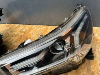 фара левая Toyota 2023, 2.8 л., 1GD-FTV, дизель, АКПП, чёрный, пикап, полный привод, правый руль, 0K181, 0K180, 0K179, 0K178