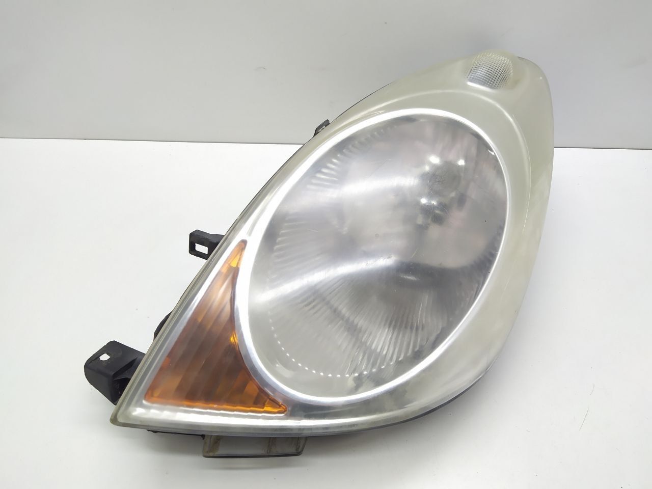 фара левая Nissan Note E11 2007, 260609U000 - фото №1