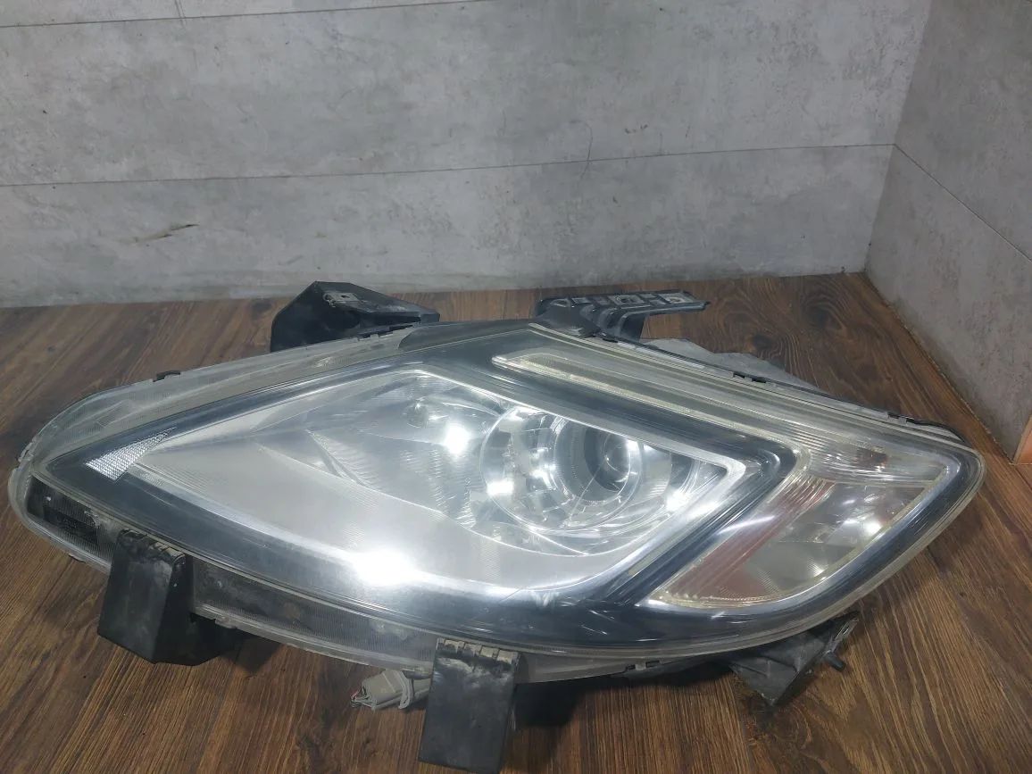 фара левая Mazda CX-9 1 поколение TB (2007 - 2009), TD86510L0, TD86510L0B, TD86510L0C - фото №1
