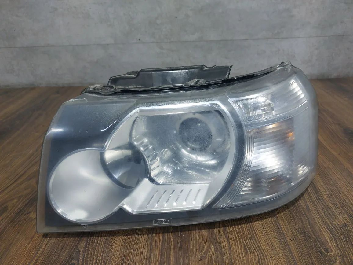 фара левая Land Rover Freelander 2 поколение L359 (2006 - 2010), LR014423, LR021910, LR025243, LR035863, LR043972, LR057303 - фото №1