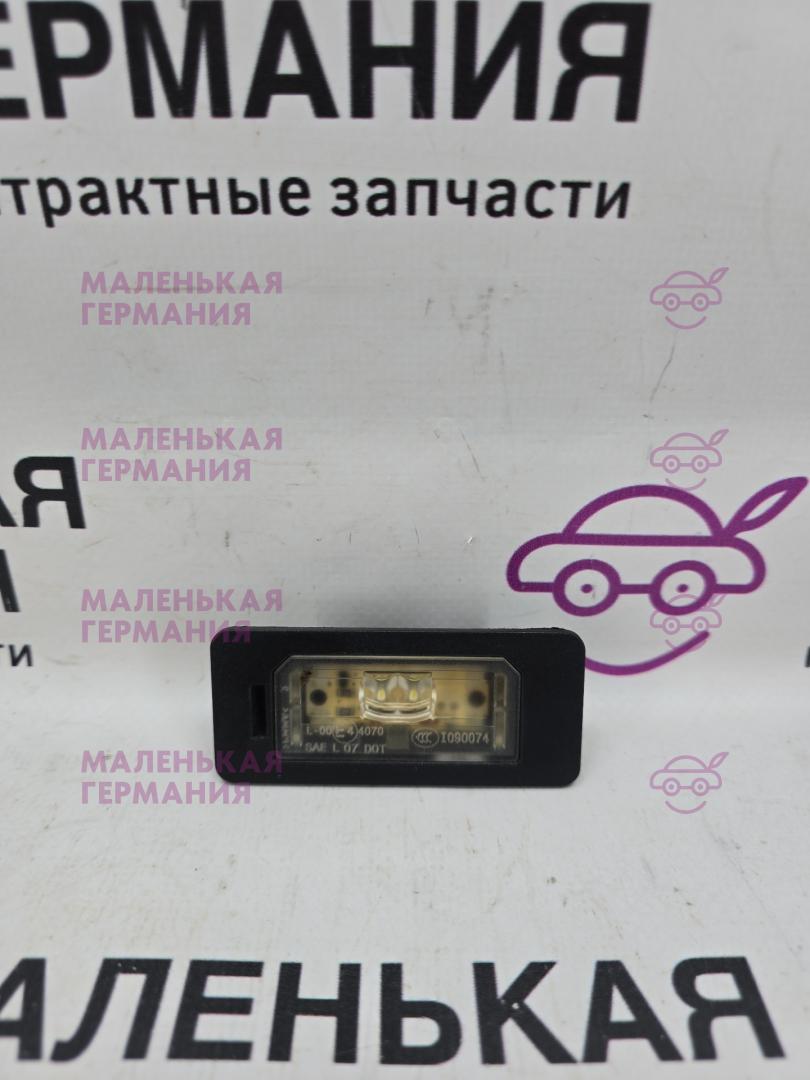 подсветка номера BMW X5 F15 2014, 3.0 л., N57 D30 A, дизель, АКПП, mineralweiss metallic (a96), полный привод, правый руль, 63267193293, 7193293 - фото №1