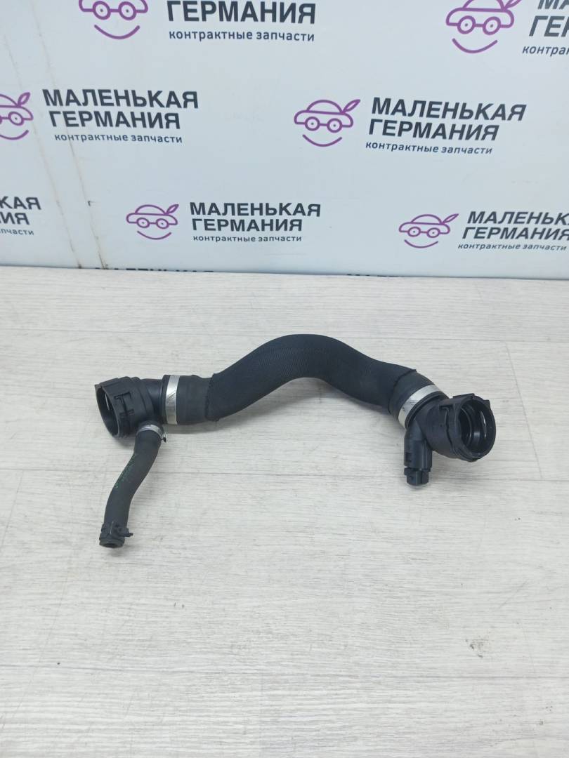 патрубок радиатора BMW 6 серия F06/F12/F13 2013, 4.4 л., N63 B44 B, бензин, black sapphire metallic (475), 17127575427, 7575620, 7576334 - фото №1