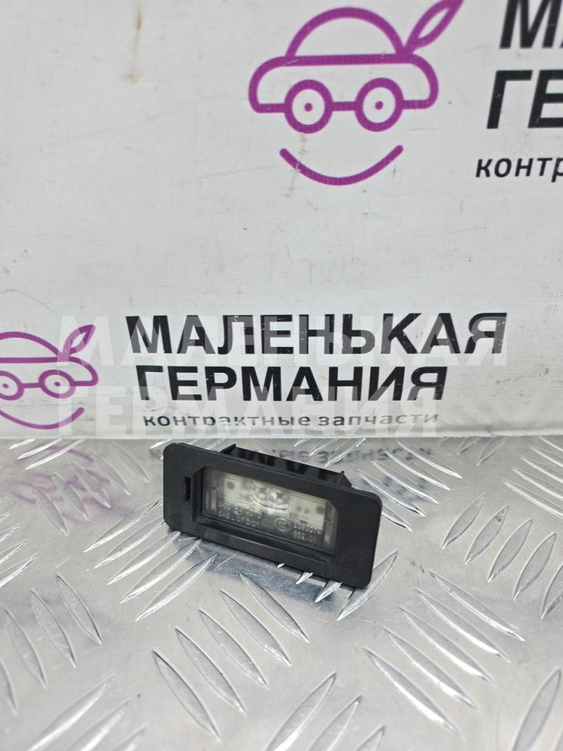 подсветка номера BMW 5 серия G30/G31 G30 2017, 2.0 л., B47 D20 A, дизель, АКПП, black sapphire metallic (475), седан, задний привод, правый руль, 63267410302, 7410302 - фото №1