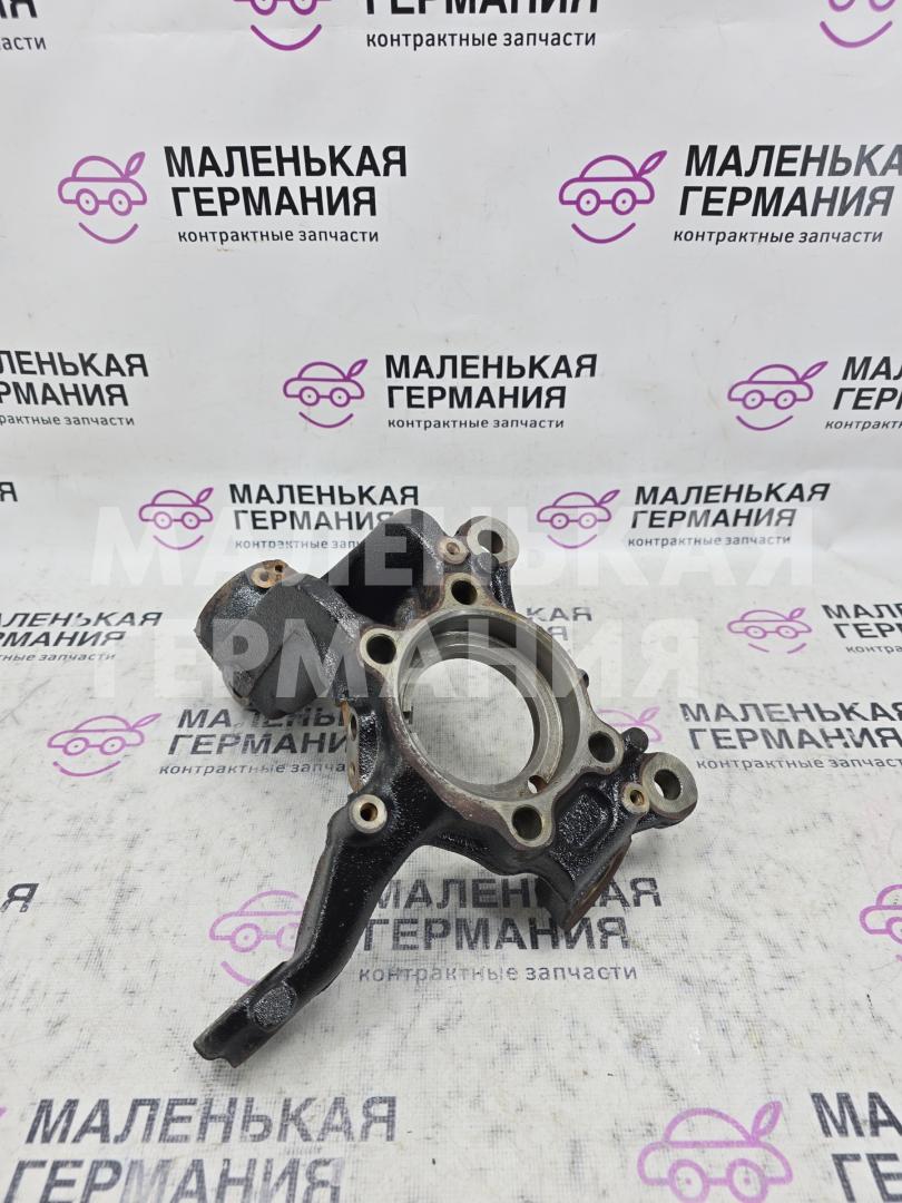 кулак поворотный правый Volkswagen Golf GTI 6 поколение 2011, 2.0 л., CCZB, бензин, робот, b4/b9a белый, хетчбэк 5 дв., передний привод, правый руль, 1K0407256A, 1K0407256AA - фото №1