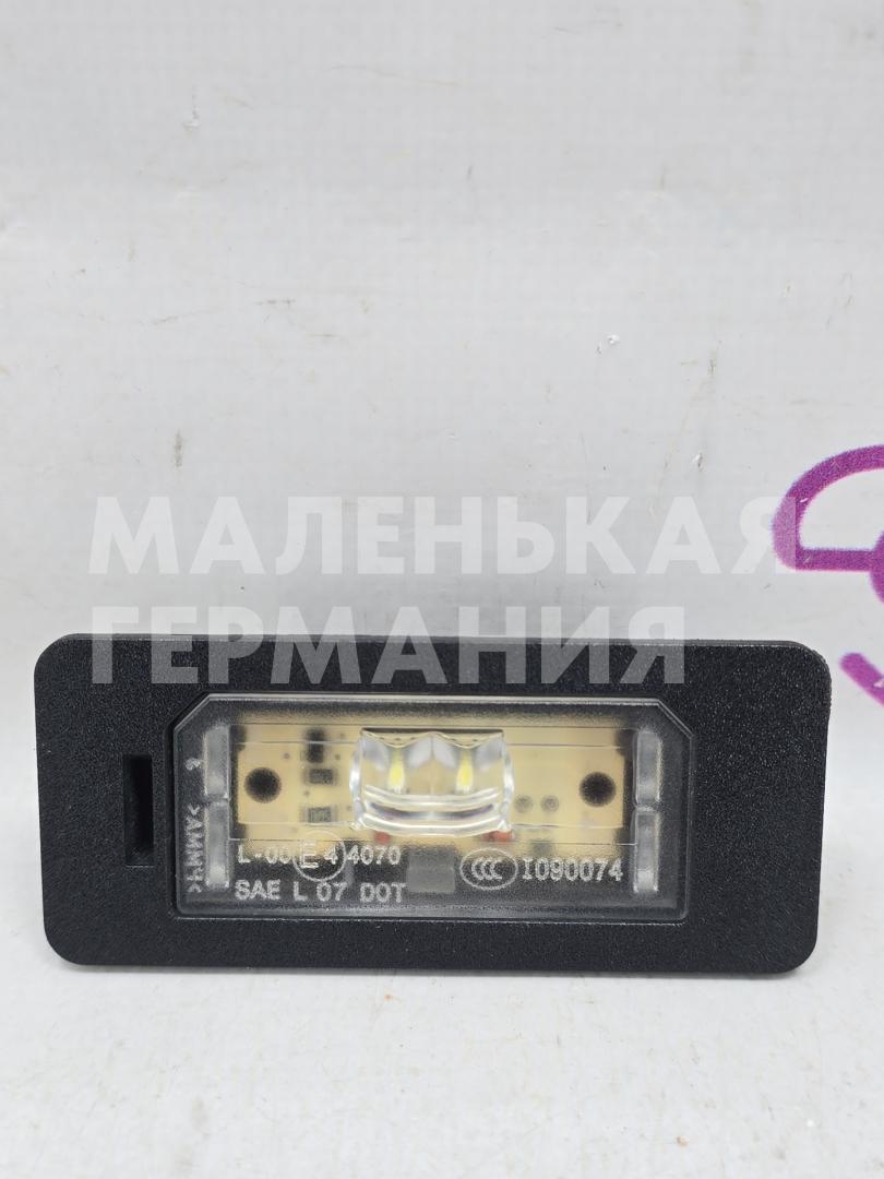 подсветка номера BMW X5 F15 2013, 3.0 л., N57 D30 A, дизель, АКПП, mineralweiss metallic (a96), внедорожник 5 дв., полный привод, правый руль, 63267193293, 7193293 - фото №1