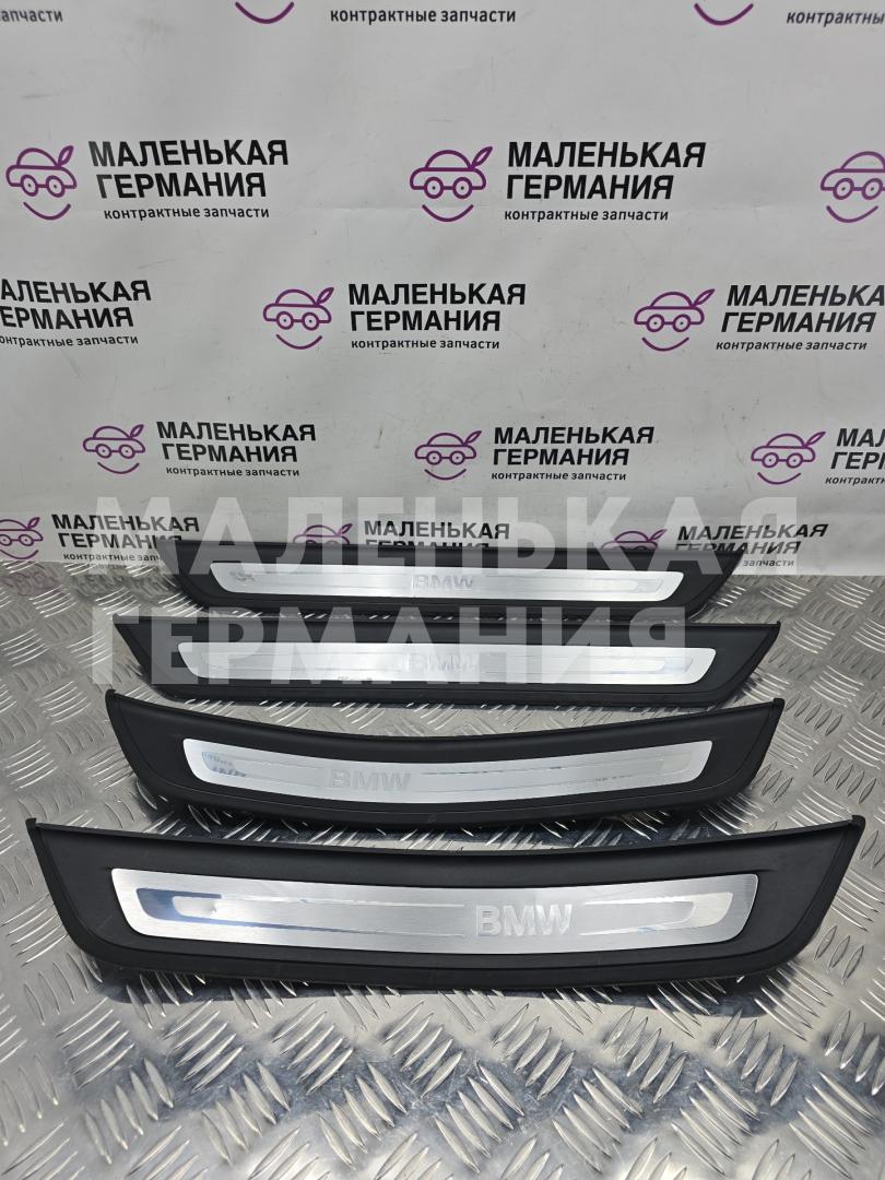 комплект накладок на пороги (внутренние) BMW 5 серия G30/G31 G30 2018, 2.0 л., B48 B20 A, бензин, АКПП, черный 475, седан, задний привод, правый руль, 51477398321, 7398321, 51477381330, 7381330, 51477381329, 7381329 - фото №1