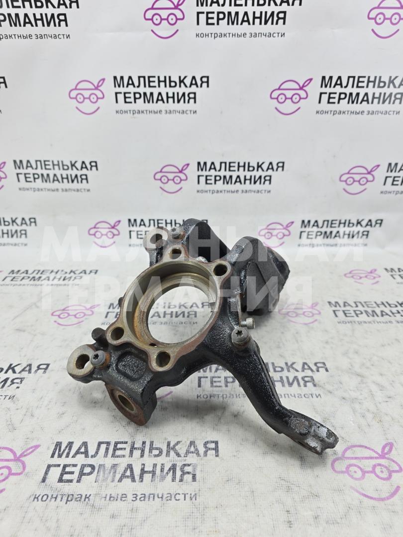 кулак поворотный левый Volkswagen Golf GTI 6 поколение 2011, 2.0 л., CCZB, бензин, робот, b4/b9a белый, хетчбэк 5 дв., передний привод, правый руль, 1K0407255A, 1K0407255AA - фото №1