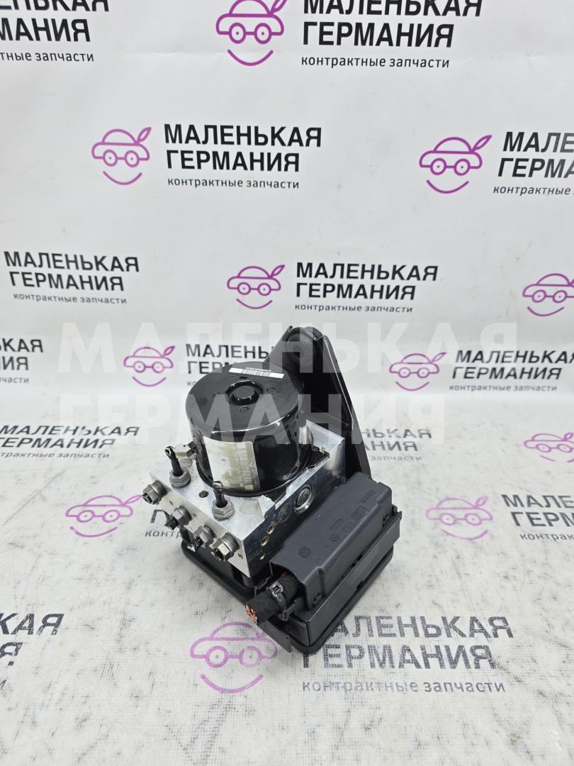 блок ABS Volkswagen Golf GTI 6 поколение 2011, 2.0 л., CCZB, бензин, робот, b4/b9a белый, хетчбэк 5 дв., передний привод, правый руль, 1K0907379BJ, 1K0614235D - фото №1