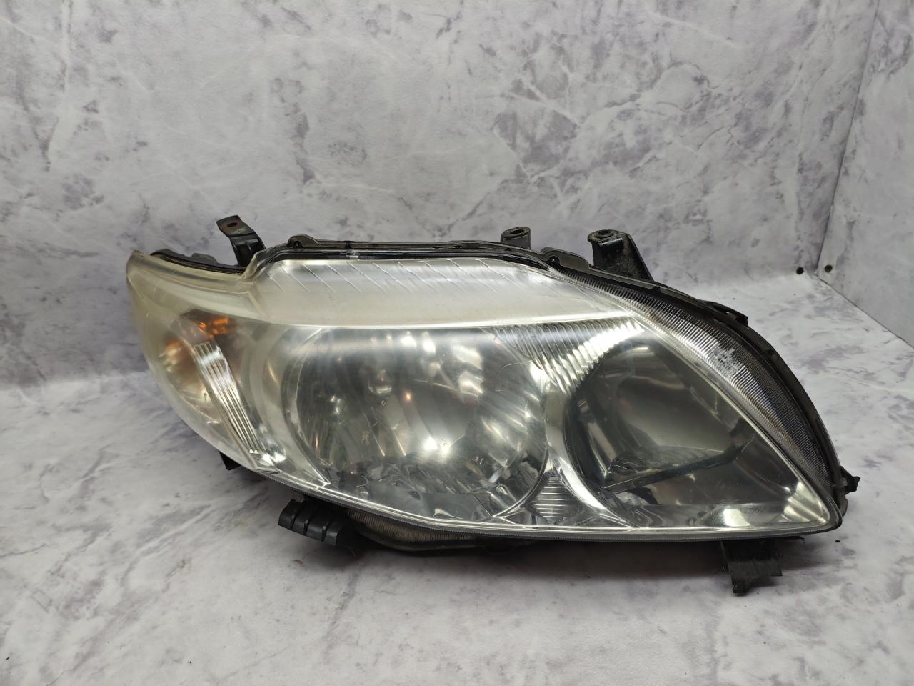 фара правая Toyota Corolla 10 поколение (E140/E150) (2007 - 2010), 1.4 л., 4ZZ-FE, бензин, МКПП, седан - фото №1