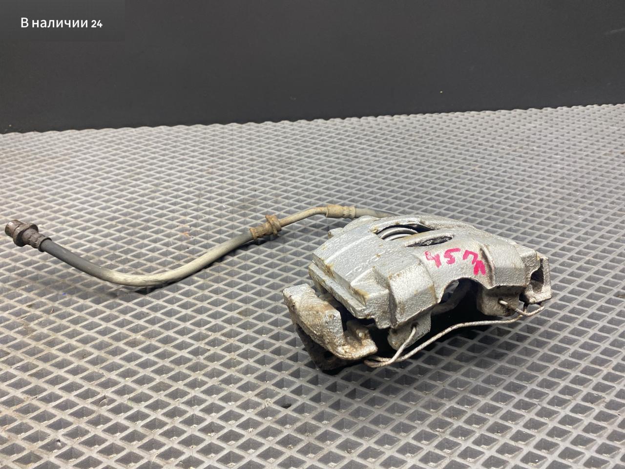 суппорт передний левый Toyota Yaris XP9 KSP90 (2005 - 2009), 1.0 л., 1KR-FE, бензин, МКПП, хетчбэк 5 дв., передний привод, 477500D070 - фото №1