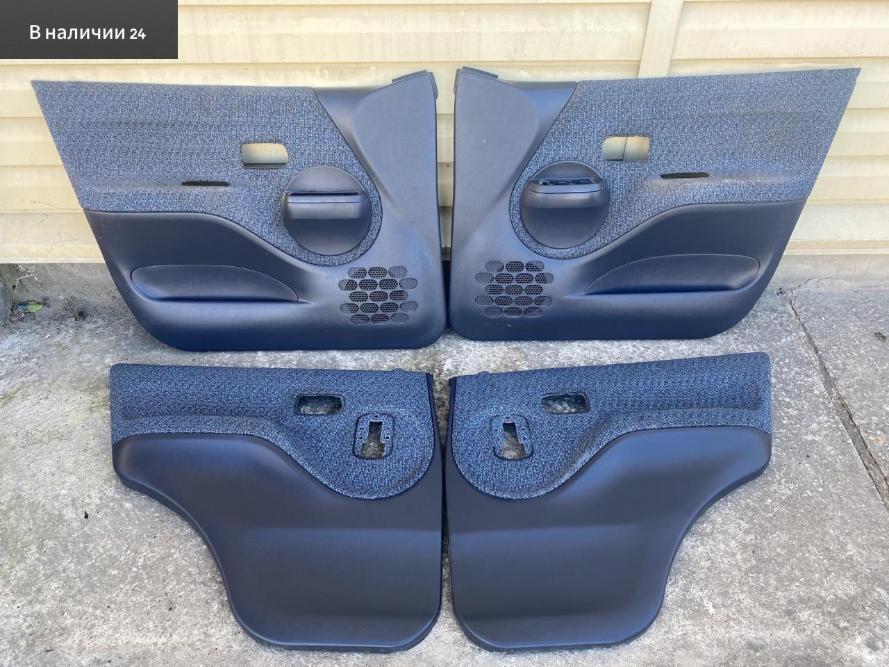 Обшивка двери (комплект) Toyota Cami 1 поколение J122E 2001, 1.3 л., K3-VE, бензин, АКПП, 6a5 - черный, внедорожник 5 дв., задний привод, правый руль, 67605-87420-03, 67606-87419-03, 67607-87413-03, 67608-87413-03 - фото №1