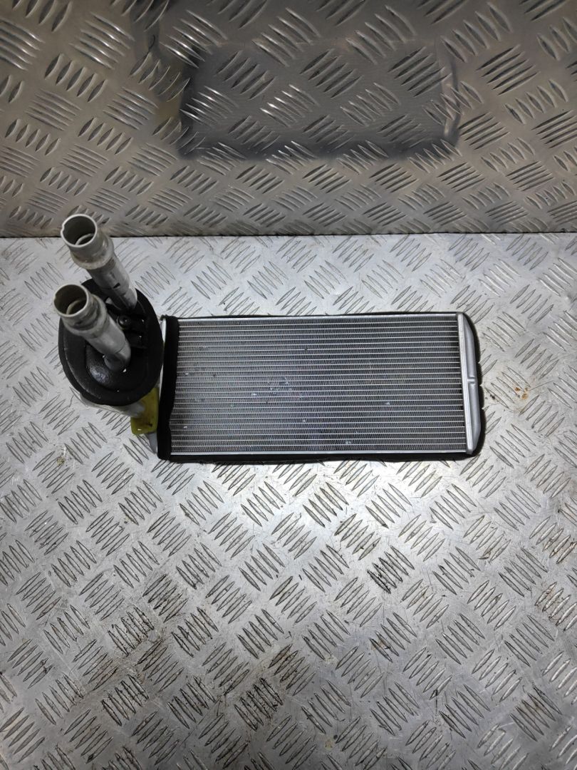 радиатор отопителя (печки) Citroen Berlingo 2 поколение (B9) 2012, 1.6 л., HDi, 9HN (DV6ETED), дизель, МКПП, белый, фургон, передний привод, правый руль, 5E2210400 - фото №1