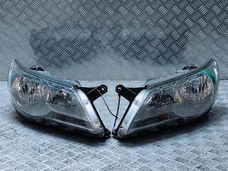 фара левая Volkswagen Tiguan 1 поколение 2009, 2.0 л., TDi, CBAB, дизель, серый, правый руль