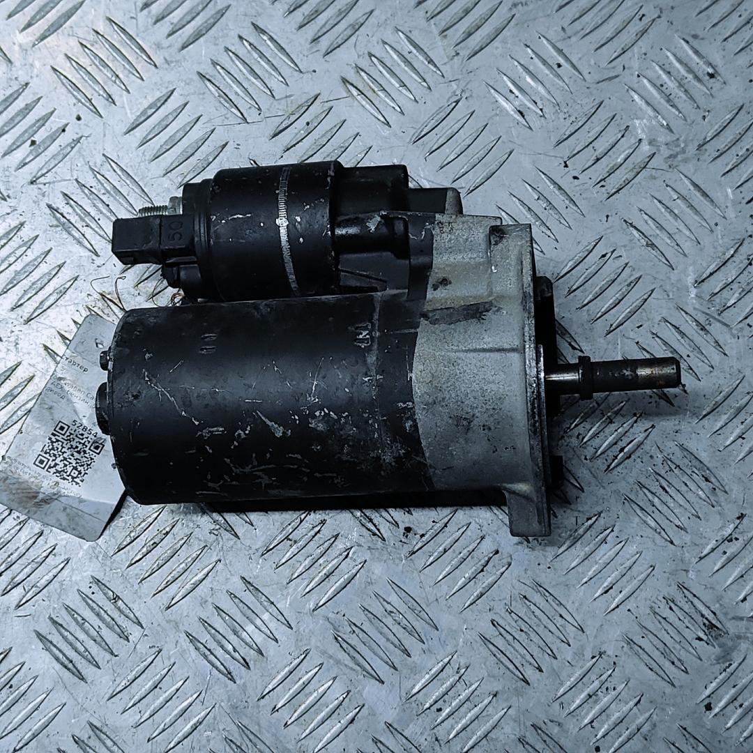 стартер Volkswagen Caddy 2 поколение 2000, 1.4 л., i, AEX, бензин, 5МКПП, передний привод, 0001112027, 036911023Q, 1005821601, 10062097 - фото №1