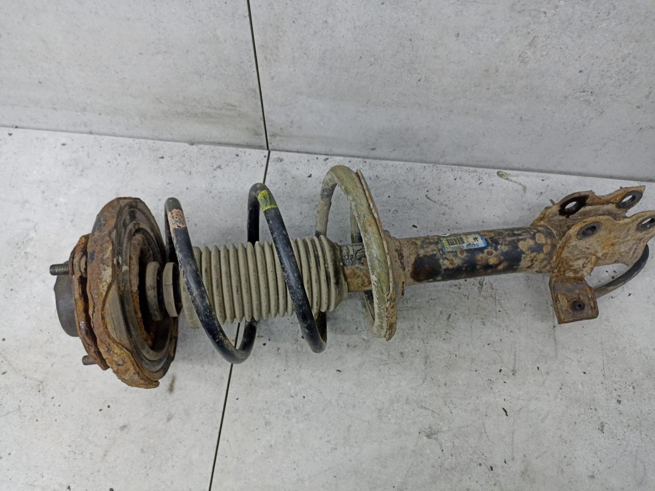 амортизатор передний левый Nissan X-Trail T30 (2000 - 2004), 54303EQ000 - фото №1