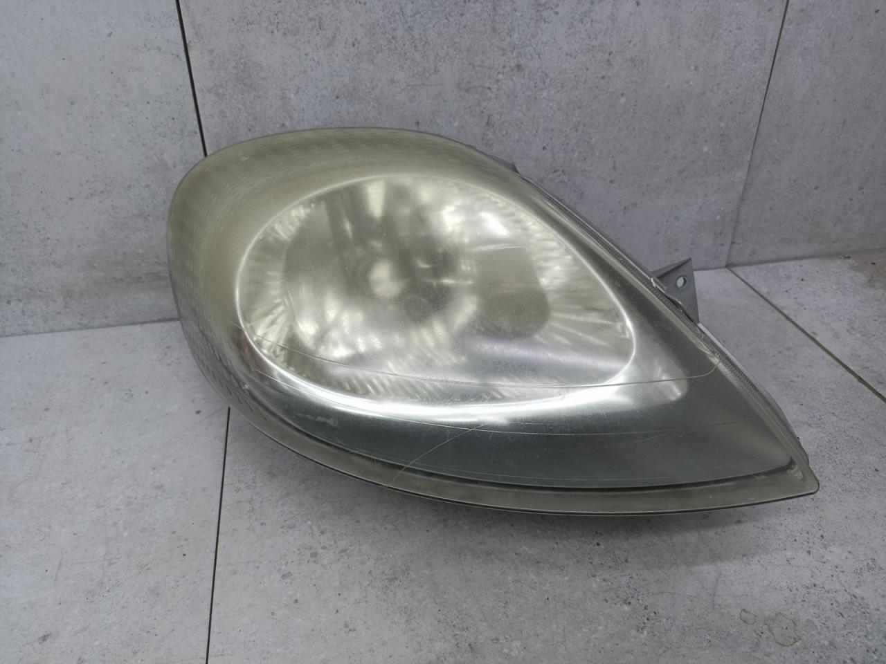 фара правая Renault Trafic 2 поколение 2006, 7700311374 - фото №1