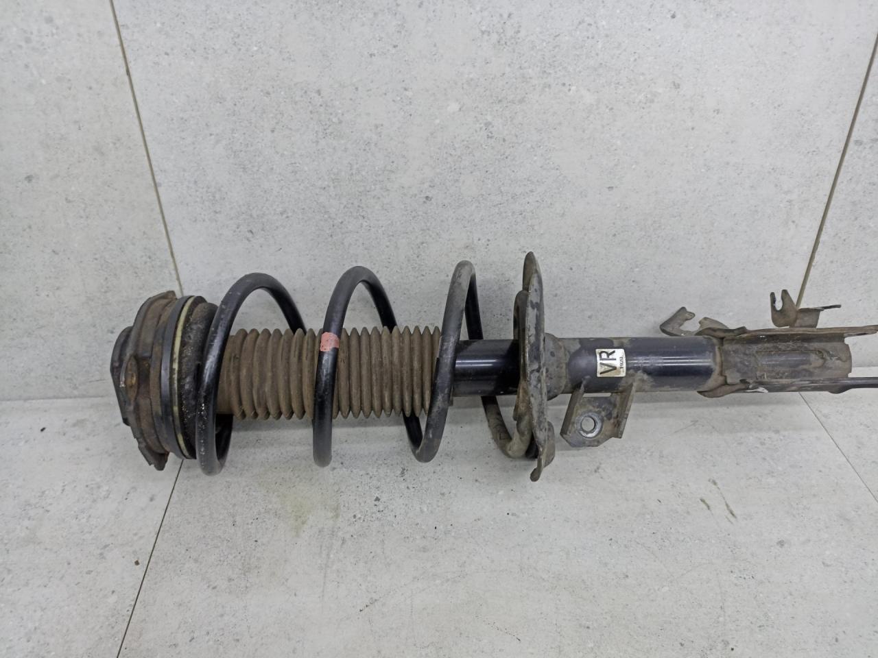 амортизатор передний правый Nissan X-Trail T31 2011, 543023UB0A - фото №1