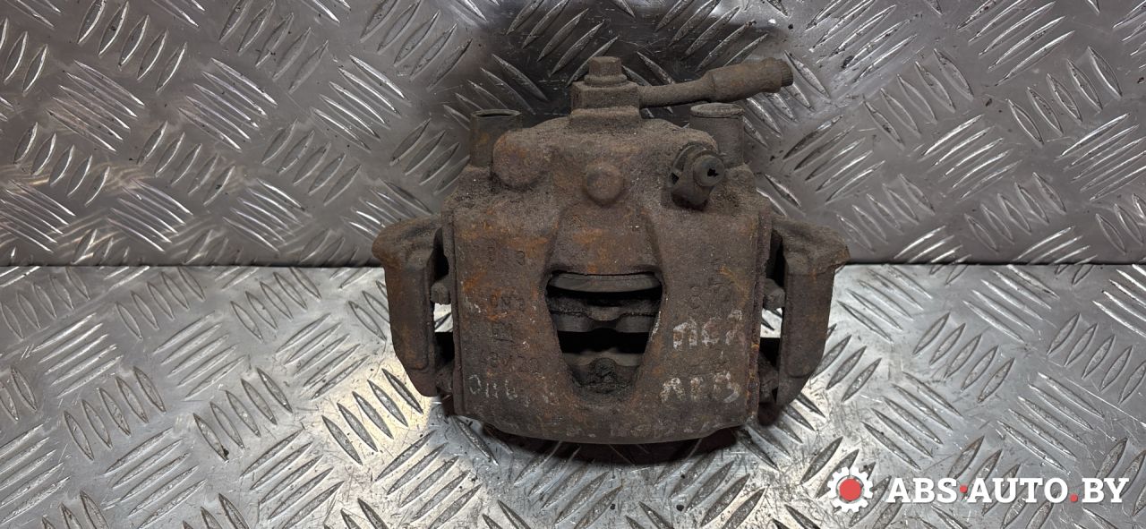 суппорт передний левый Opel Tigra 1 поколение 2000 - фото №1