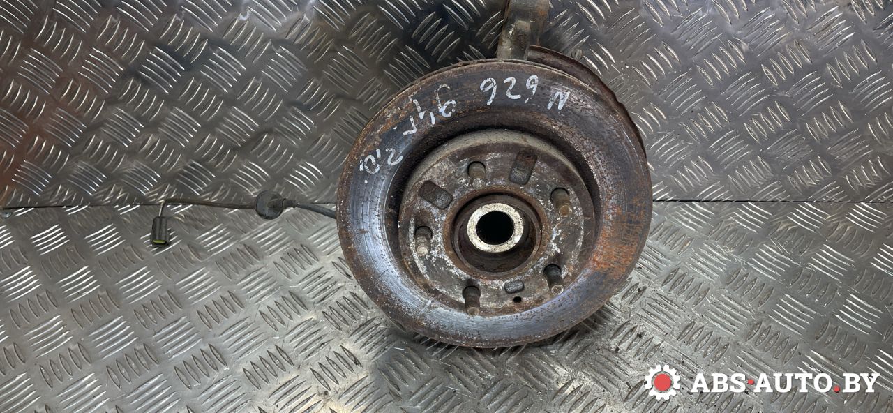 ступица передняя левая Mazda 626 GE 1994, 2.0 л., бензин - фото №1