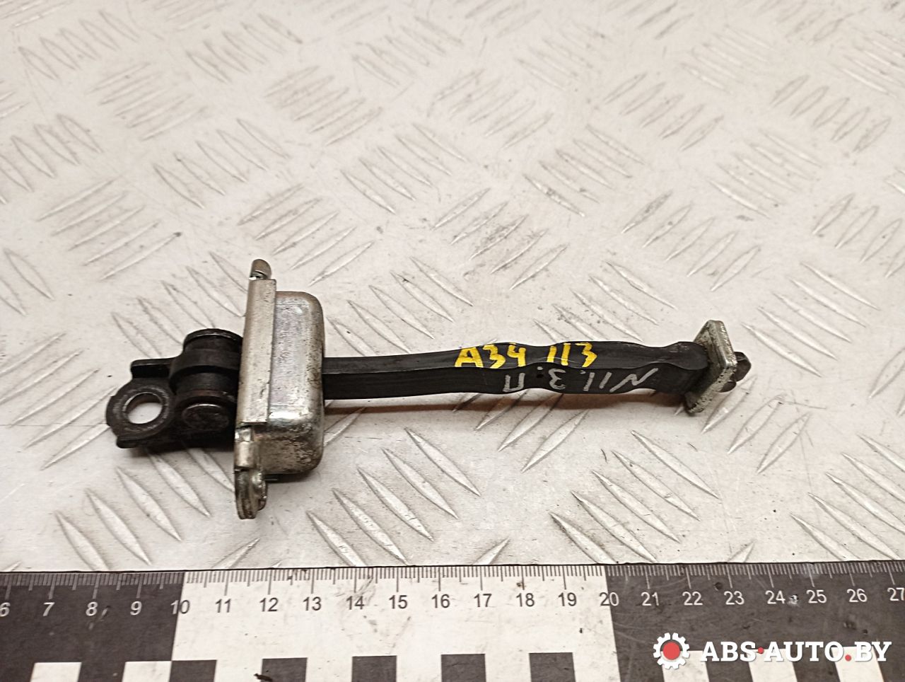 ограничитель открывания двери задней Nissan Qashqai 1 поколение 2008, 1.5 л., K9K 282, дизель, МКПП, правый руль, 82430JD000 - фото №1