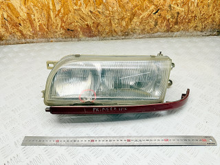 фара левая Nissan Primera P10 1994, 10024551