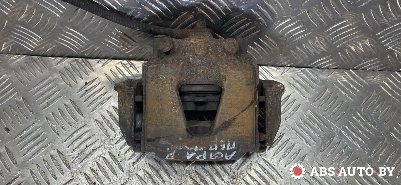 суппорт передний правый Opel Astra F 1994, 1.6 л., бензин - фото №1