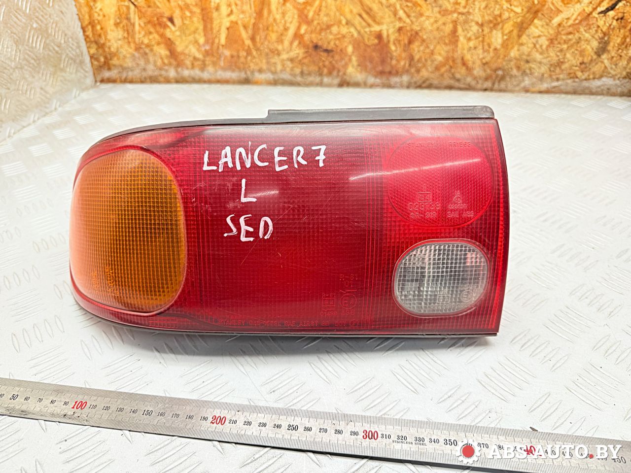фонарь задний левый Mitsubishi Lancer 7 поколение 1995, седан, 0431563L - фото №1