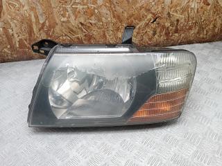 фара левая Mitsubishi Pajero 3 поколение 2002, 3.2 л., дизель, МКПП, внедорожник 3 дв.
