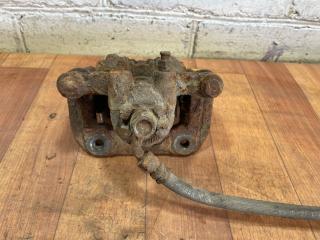 суппорт задний левый Honda CR-V 2 поколение [рестайлинг] 2005, 2.4 л., бензин, МКПП, внедорожник 5 дв.