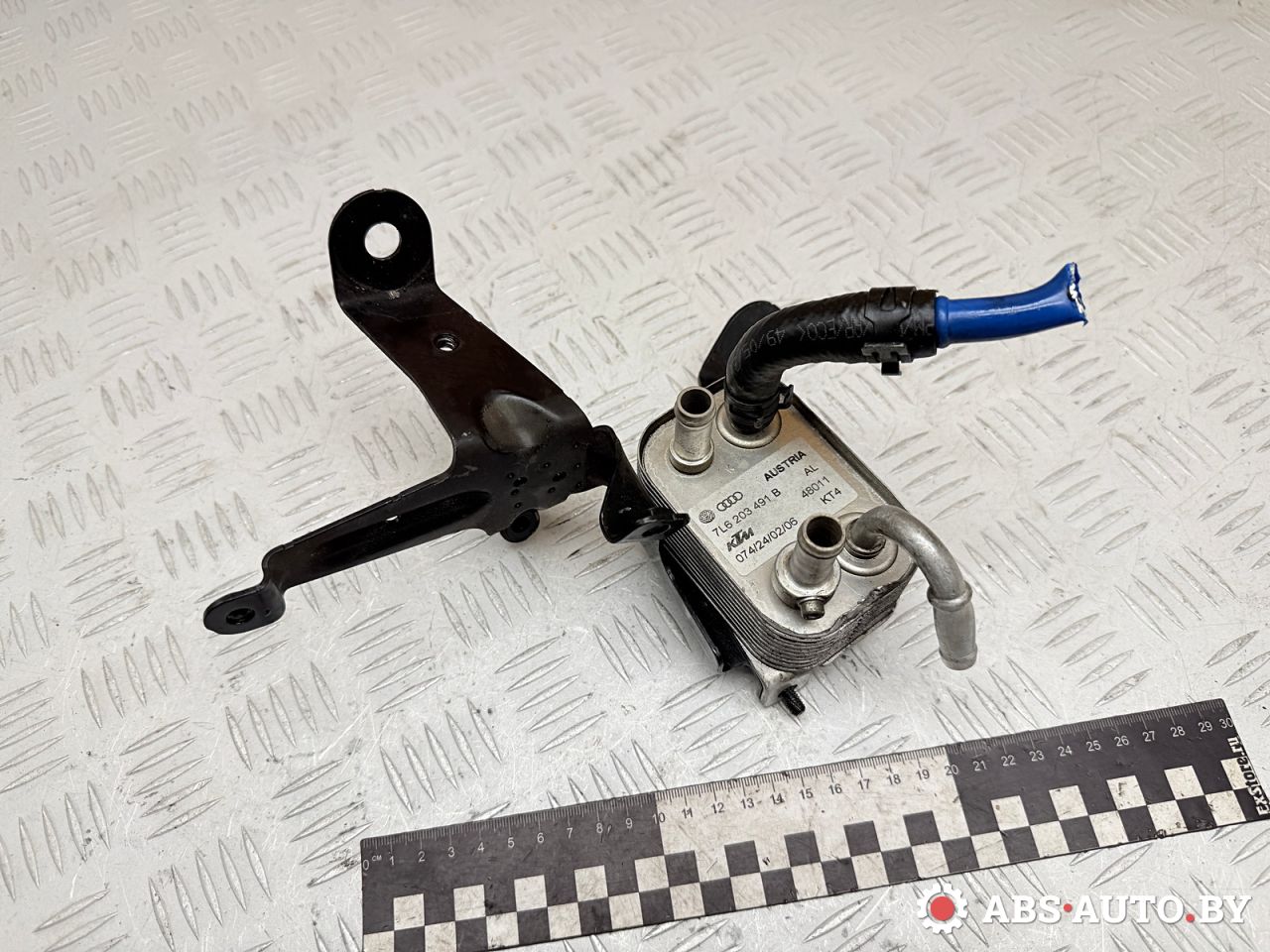 Радиатор охлаждения топлива Volkswagen Touareg 1 поколение 2006, 3.0 л., BKS, дизель, АКПП, внедорожник 5 дв., полный привод, 7L6203491B - фото №1